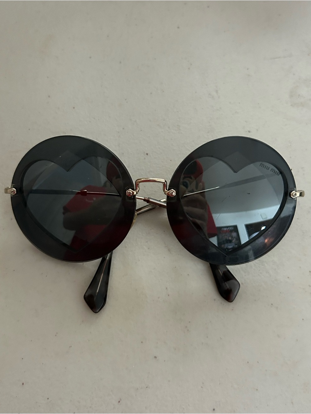 Miu Miu Black Round Sunglasses with Heart-Detail